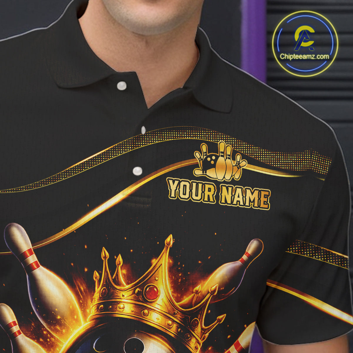 Close-up front view of custom black gold bowling polo shirt showing Your Name, fiery bowling ball graphic and gold stripe pattern