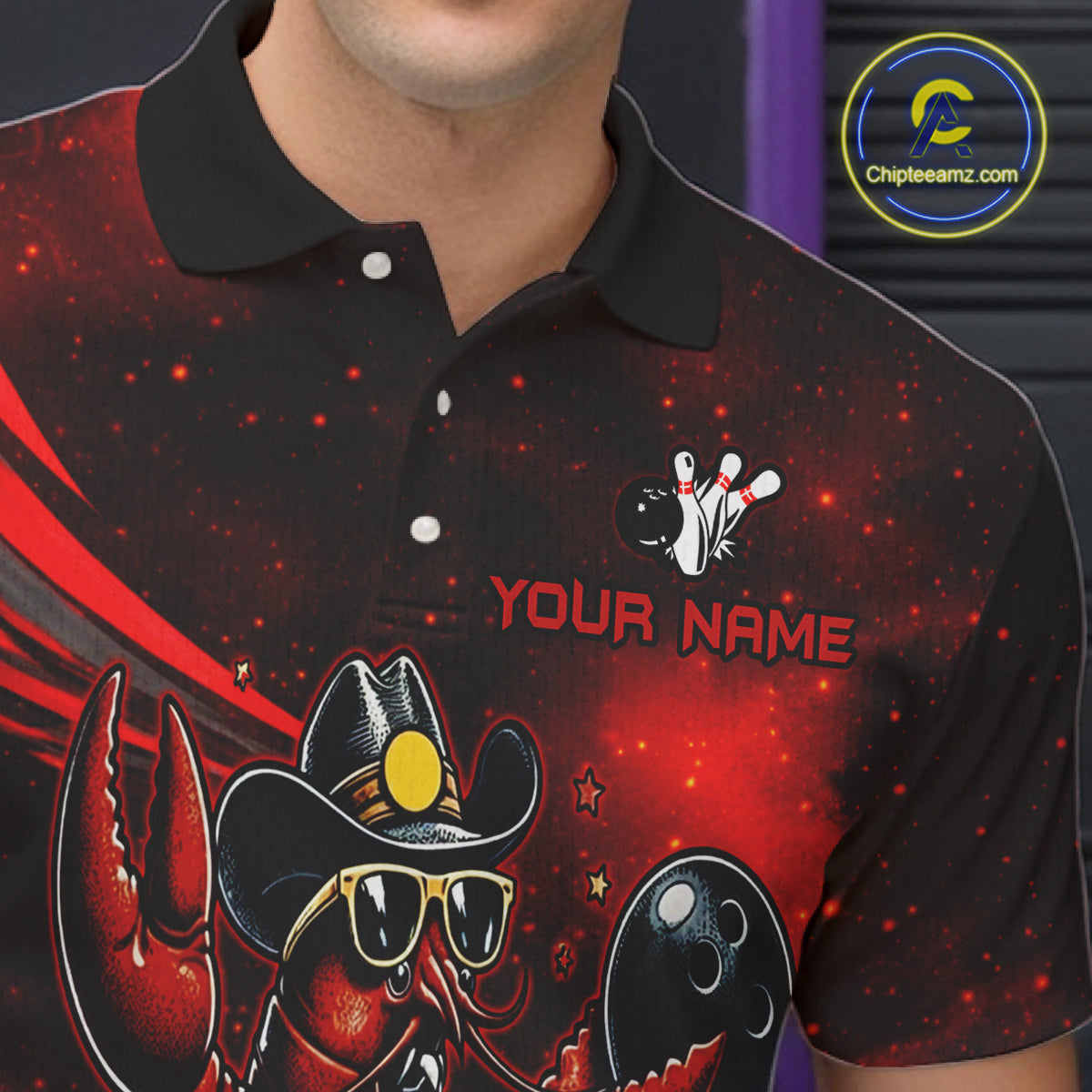 Black polo shirt with red and white graphics and 'Your Name' text, brand logo visible.