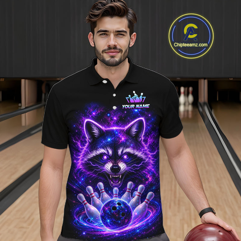 A man wearing a black short-sleeve polo shirt with a vibrant purple and blue neon raccoon graphic on the front, standing in a bowling alley. The shirt features a custom name placeholder and a visible 'Chipleamz.
