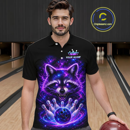 A man wearing a black short-sleeve polo shirt with a vibrant purple and blue neon raccoon graphic on the front, standing in a bowling alley. The shirt features a custom name placeholder and a visible 'Chipleamz.