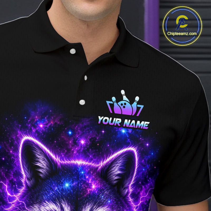 A close-up of a person wearing a black polo shirt with a vibrant purple and blue cosmic wolf graphic and a custom bowling pins and crown design above the text 'YOUR NAME'.