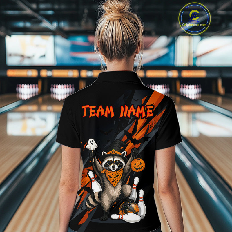 Women wearing a black Halloween bowling polo featuring a raccoon wearing an orange bandana, ghost and pumpkin accents, bowling pins and ball, with personalized name and team name text.