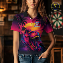 Load image into Gallery viewer, Women wearing darts polo shirt featuring a dinosaur holding a dartboard with sunset and palm tree artwork on a colorful background.