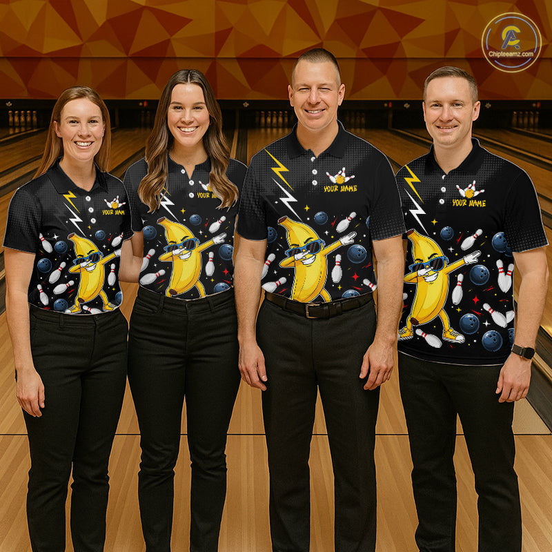 Four people wearing matching bowling polo with a banana character design on a bowling alley.