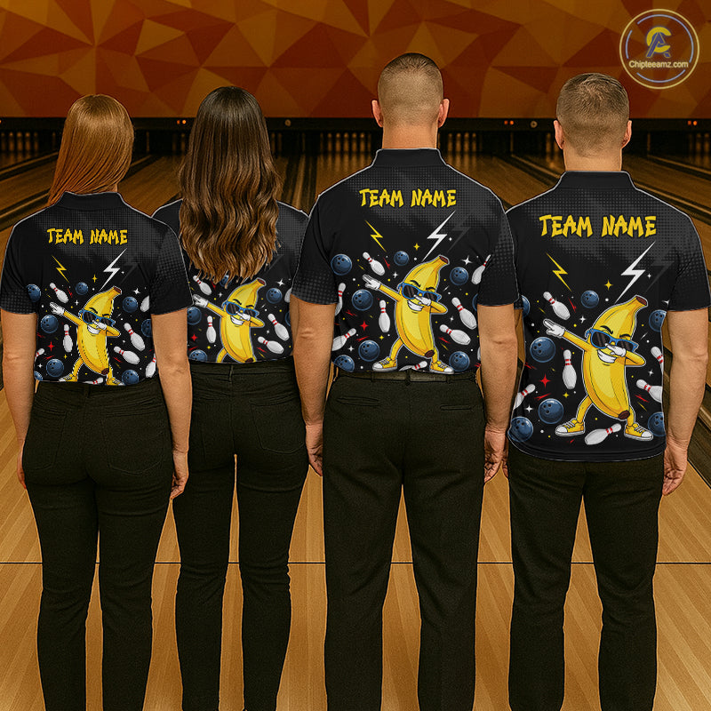 Four people wearing black bowling polo with a yellow banana character and 'Team Name' text on a bowling alley background.