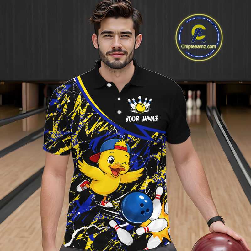 Man wearing a colorful bowling-themed shirt with a duck design in a bowling alley.