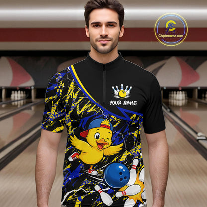 Man wearing a colorful bowling-themed shirt with a duck graphic in a bowling alley.