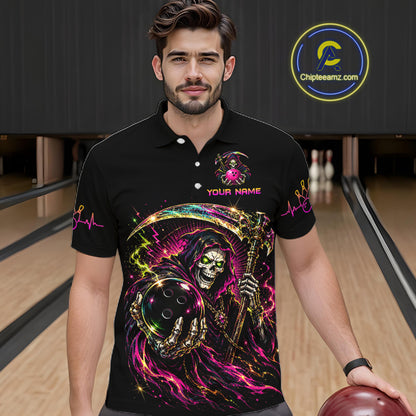 Man wearing a black polo shirt with colorful graphic design in a bowling alley.