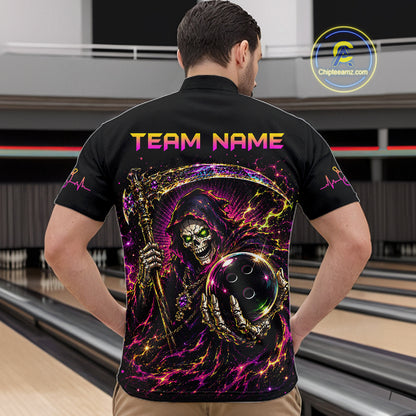 Person wearing a black bowling shirt with a colorful design and 'Team Name' text on the back, standing in a bowling alley.
