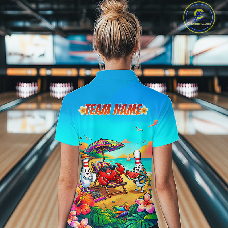 Person wearing a blue shirt with a colorful design and 'TEAM NAME' text in a bowling alley.