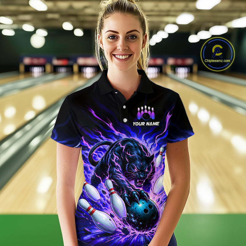 Woman wearing a custom bowling shirt with a panther design in a bowling alley.