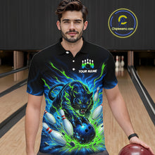 Load image into Gallery viewer, Man wearing a black bowling shirt with a colorful panther design in a bowling alley.