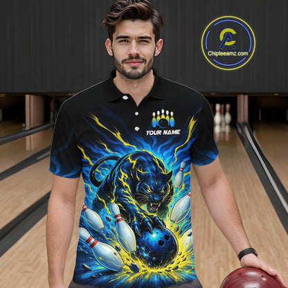 Man wearing a black bowling shirt with a panther design in a bowling alley.