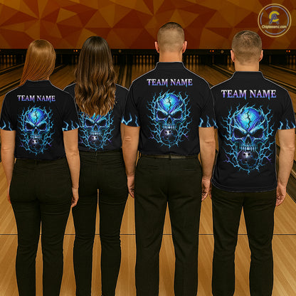 Four people standing with their backs to the camera in a bowling alley, wearing matching black short-sleeve shirts with a large blue and black skull graphic and the text 'TEAM NAME' printed across the upper back.