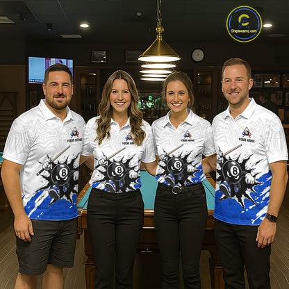 Four people wearing matching billiard shirts in a billiard alley.