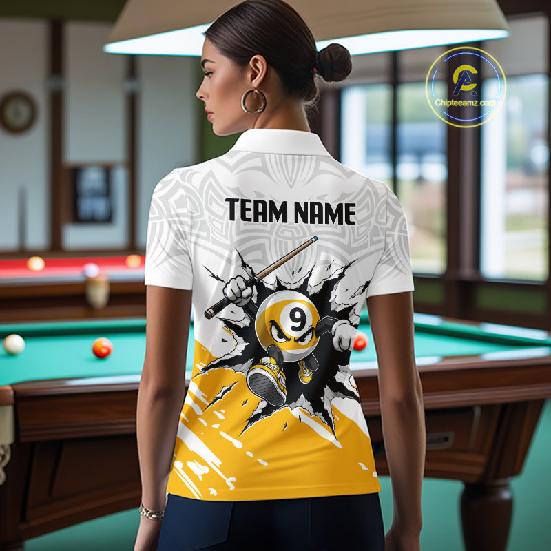 Woman wearing a white polo shirt with a pool-themed design in a billiards room.