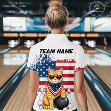 Load image into Gallery viewer, Women’s us flag cat bowling polo shirt, back view on female model in bowling lane 