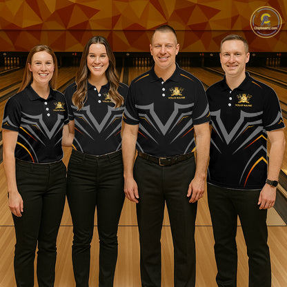 Four individuals in matching bowling team shirts standing on a bowling alley.