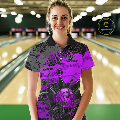 Woman wearing a custom bowling shirt with a design and text in a bowling alley.