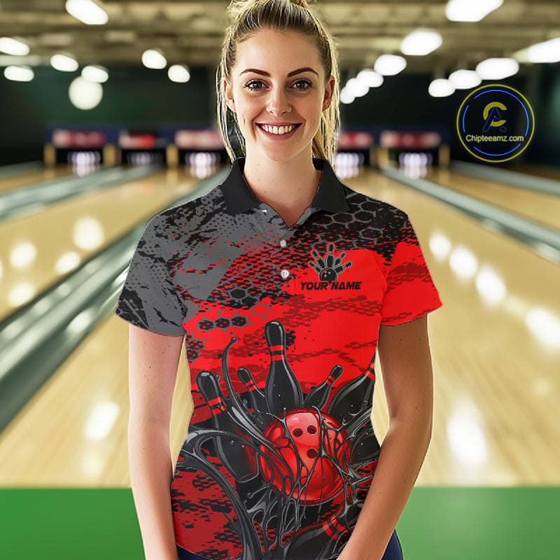 Woman wearing a red and black bowling shirt with a personalized name on a bowling alley background