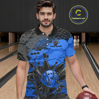 Man wearing a blue and black bowling shirt with a personalized design in a bowling alley.