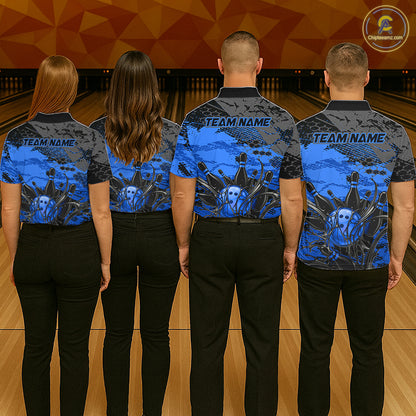Four people wearing matching blue and black shirts with a design on a bowling alley background