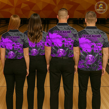 Four people wearing bowling shirts with a purple and black design on a bowling alley.
