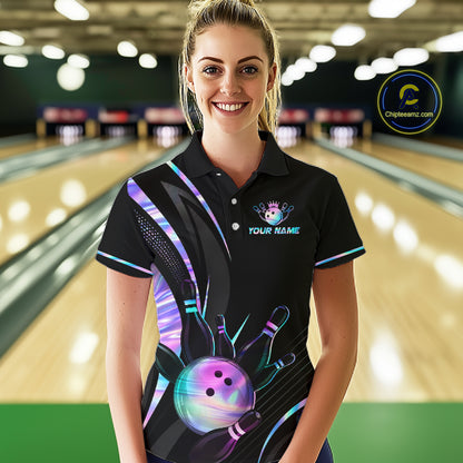 Woman wearing a custom bowling shirt with a logo and text in a bowling alley.