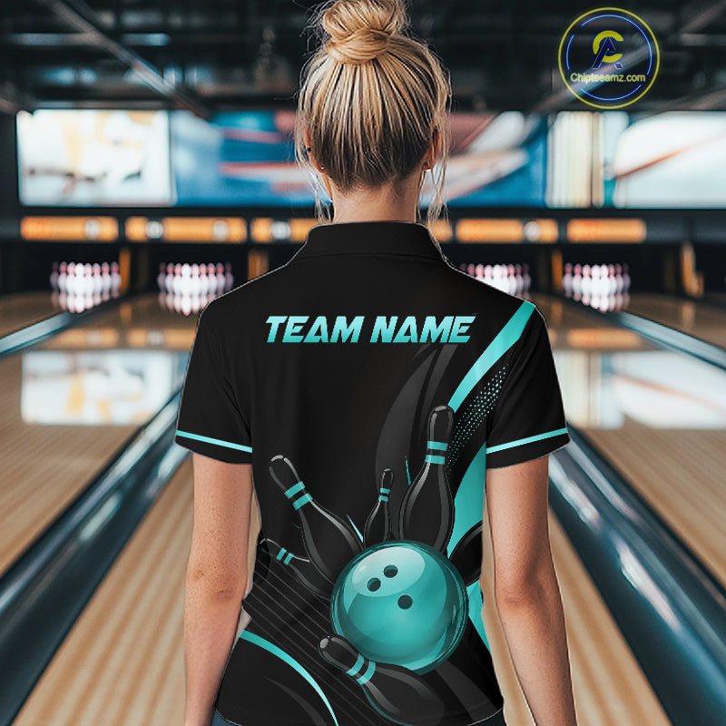 Person wearing a black bowling shirt with 'TEAM NAME' text in a bowling alley.