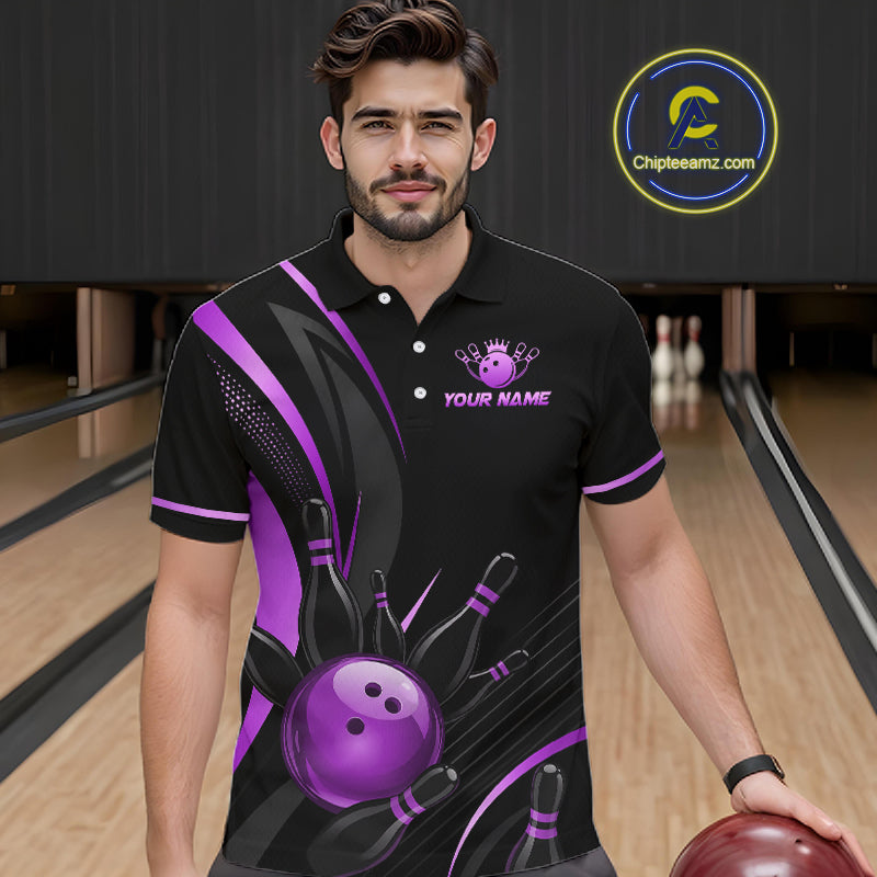 Man wearing a black and purple bowling-themed shirt in a bowling alley.