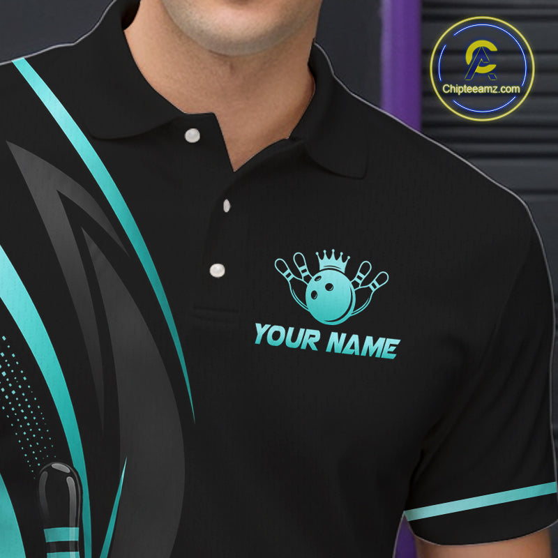 Black polo shirt with a bowling ball and lane logo and 'Your Name' text, worn by a person.