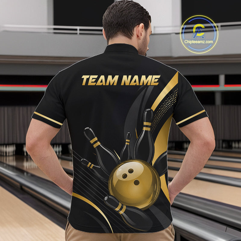 Person wearing a black bowling shirt with gold graphics and 'TEAM NAME' text at a bowling alley.