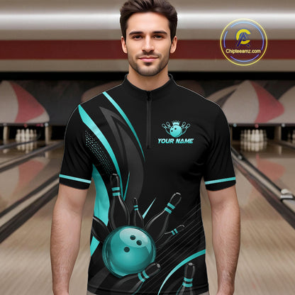 Man wearing a black and teal bowling shirt with a personalized name on a bowling alley background