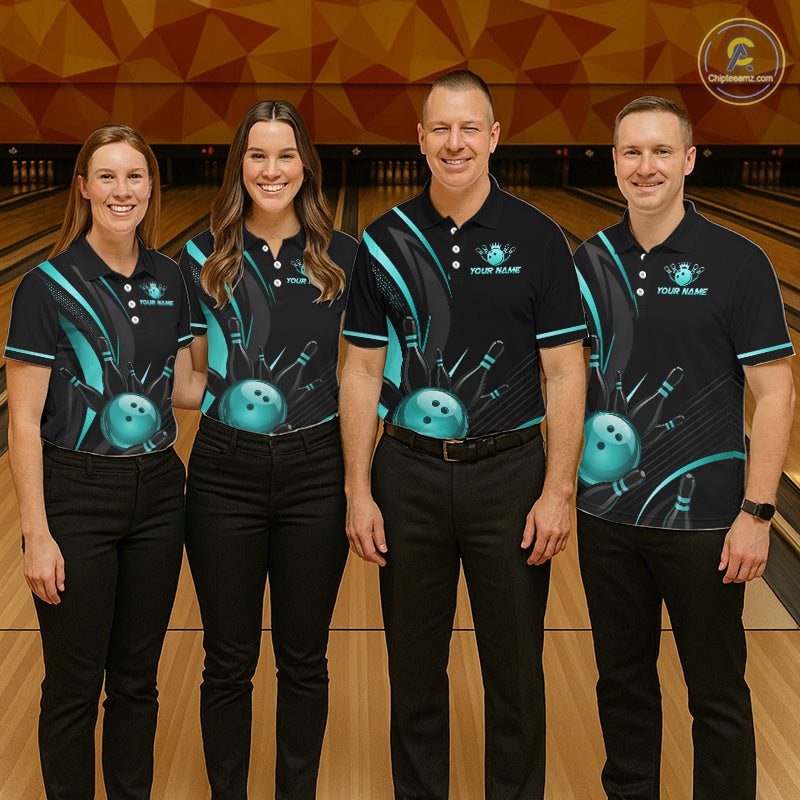 Four people wearing matching bowling team shirts on a bowling alley.