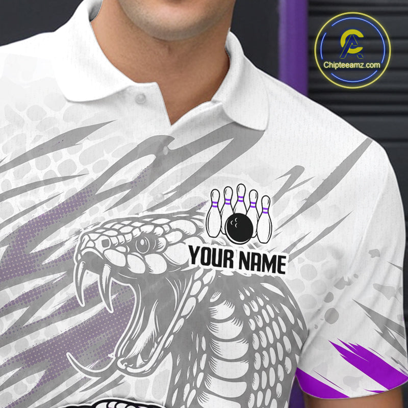 White polo shirt with snake design and bowling elements, featuring a brand logo in the corner.