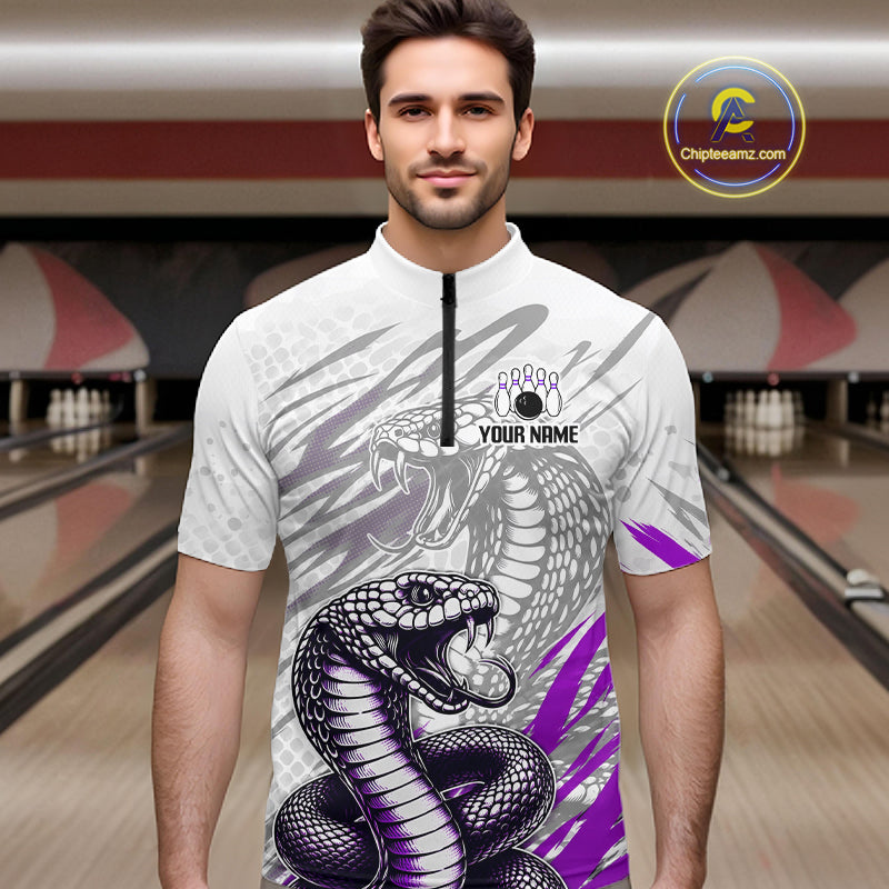 Man wearing a bowling shirt with snake design in a bowling alley