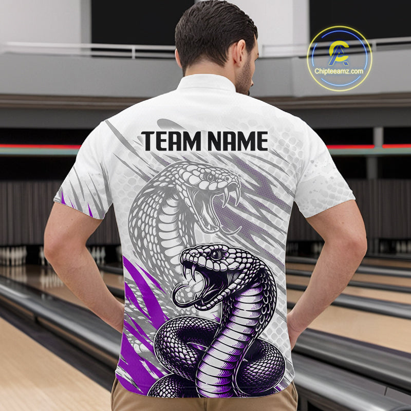 Person wearing a white shirt with snake design and 'Team Name' text at a bowling alley.