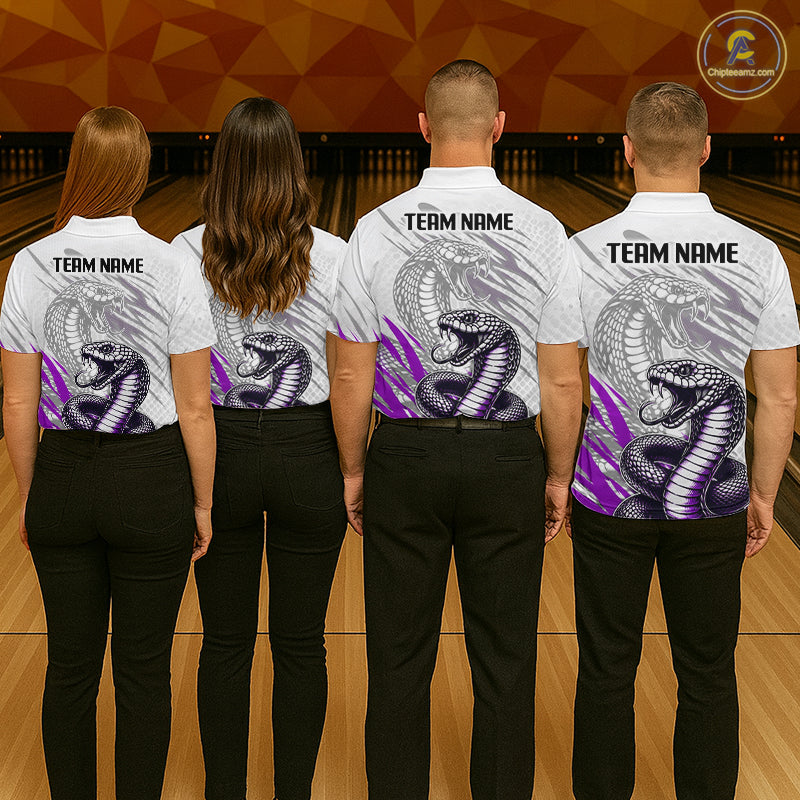 Four people wearing bowling shirts with snake design and 'Team Name' text on a bowling alley.