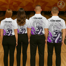 Load image into Gallery viewer, Four people wearing bowling shirts with snake design and 'Team Name' text on a bowling alley.