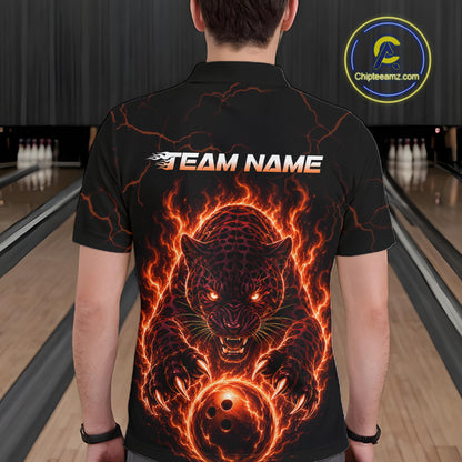 Person wearing a black t-shirt with a fiery panther design and 'TEAM NAME' text in a bowling alley.