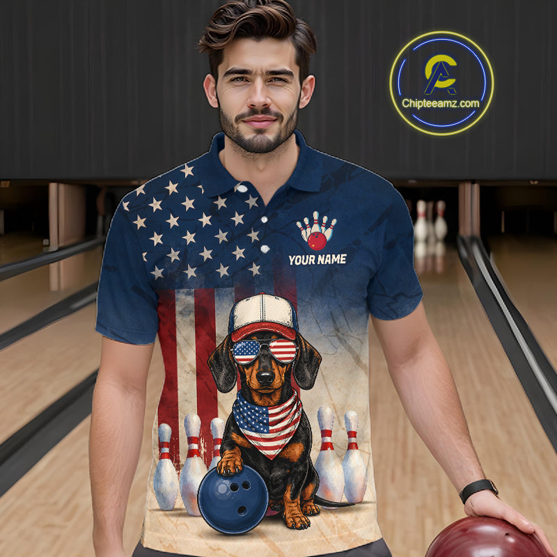Man wearing a polo shirt with a dog design and American flag, standing in a bowling alley.