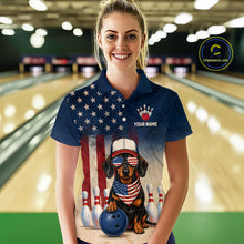 Load image into Gallery viewer, Woman wearing a bowling-themed shirt with a dog design in a bowling alley.