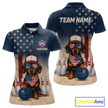Load image into Gallery viewer, Polo shirt with dachshund graphic, American flag, and bowling elements on a white background