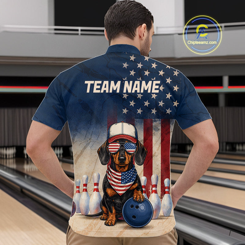 Man wearing a blue t-shirt with a dog graphic and 'Team Name' text in a bowling alley.