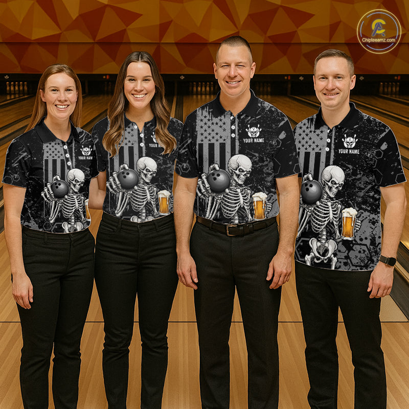 Four people standing together in a bowling alley wearing matching black short-sleeve bowling shirts with a skeleton and bowling pin graphic, paired with black pants. The shirts have a distressed American flag design and the text 'YOUR NAME' and 'TEAM'.