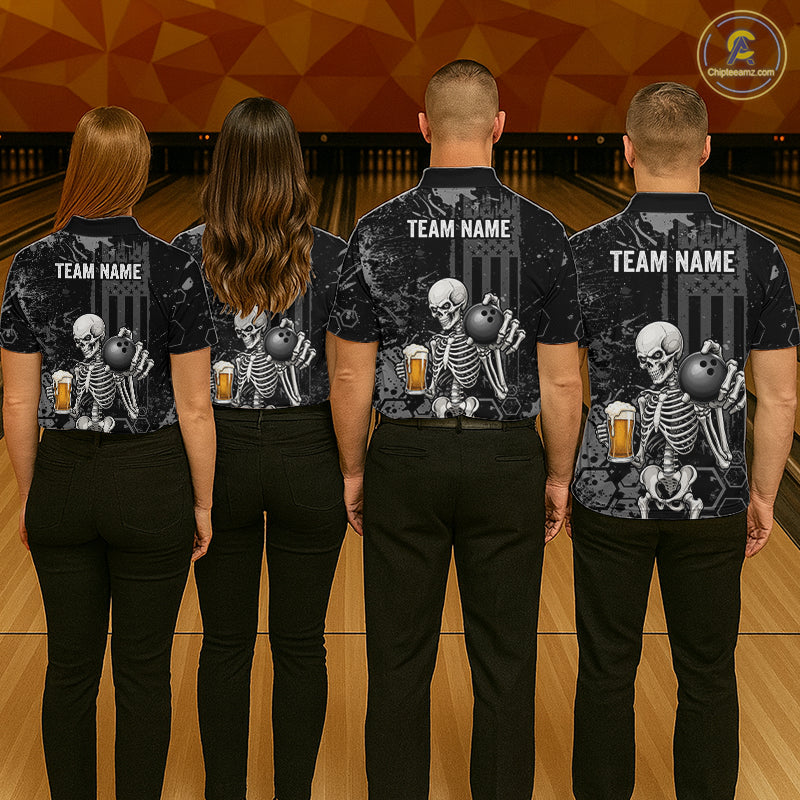Four people standing with their backs to the camera in a bowling alley, wearing matching black short-sleeve shirts with a skeleton graphic holding bowling balls and beer glasses, plus white 'TEAM NAME' text on the back.