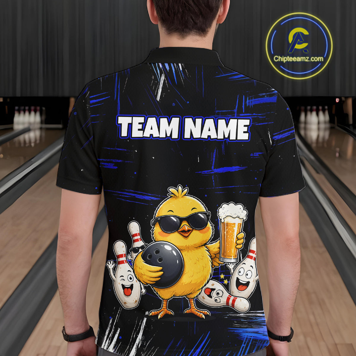 Man wearing a black bowling polo featuring a sunglasses-wearing yellow chick holding a bowling ball and beer, surrounded by smiling bowling pins, with personalized name and team name text.