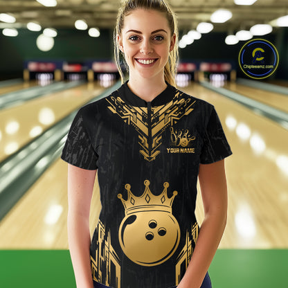 Women wearing personalized bowling quarter zip shirt with a crowned bowling ball centered among geometric gold patterns across a black layout.