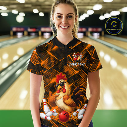 Woman wearing a orange and black bowling quarter zip shirt featuring a cool rooster mascot wearing sunglasses, a red bowling ball, bowling pins, and custom your name text.