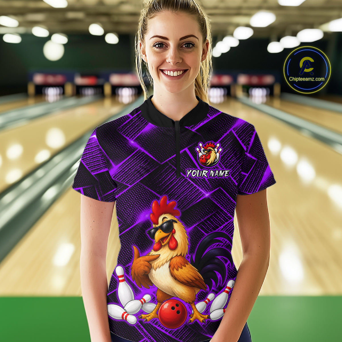 Woman wearing a purple and black bowling quarter zip shirt featuring a cool rooster mascot wearing sunglasses, a red bowling ball, bowling pins, and custom your name text.